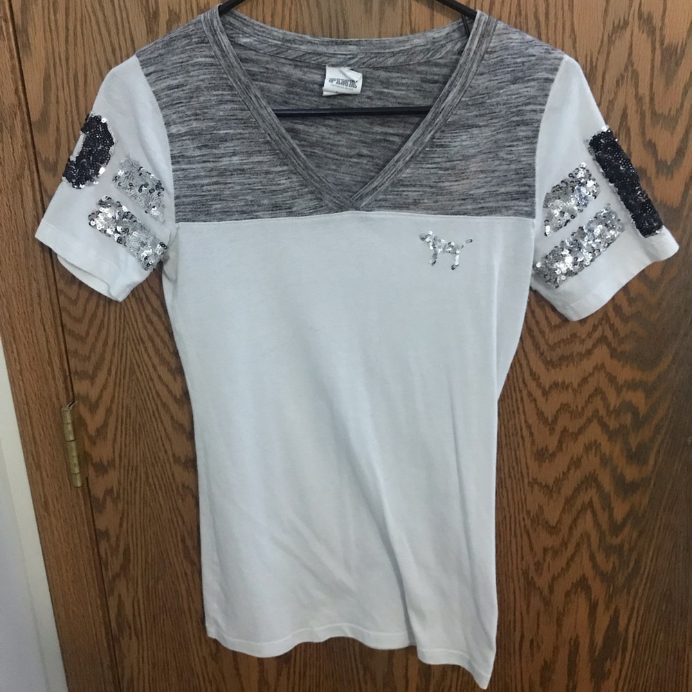 PINK short sleeved shirt size small.